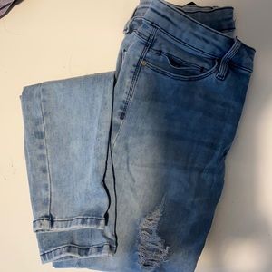 Distressed light blue skinny jeans